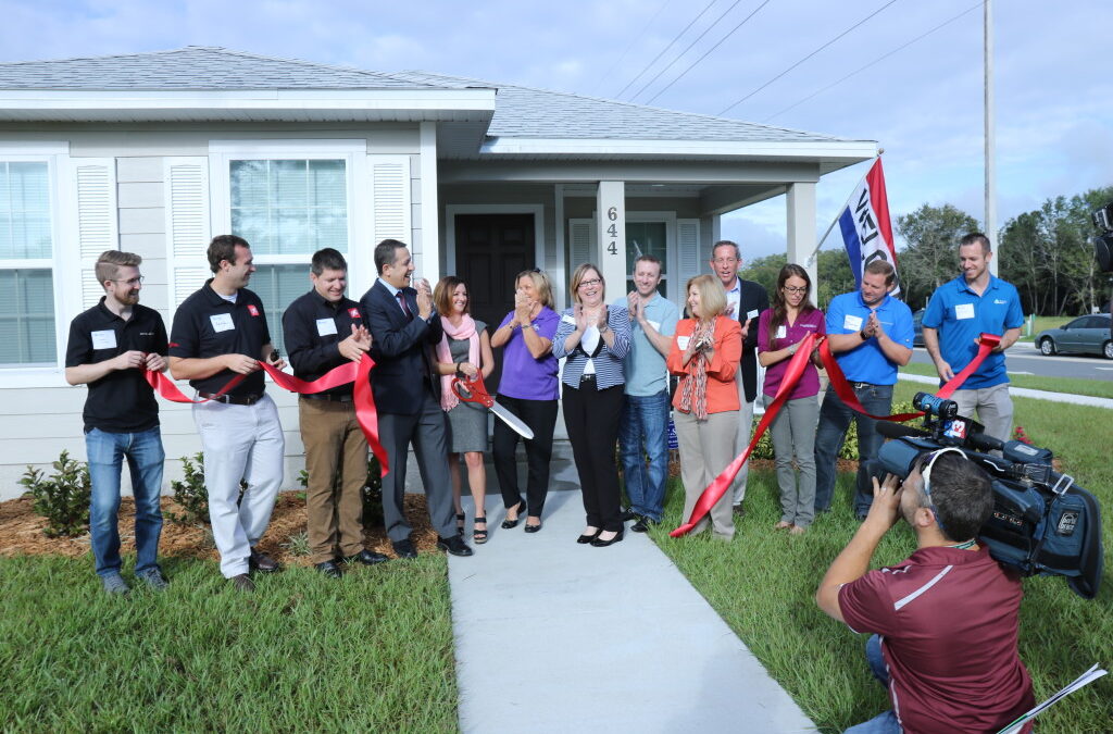NAUTIQUE EMPLOYEES CELEBRATE WORLD HABITAT DAY WITH HABITAT FOR HUMANITY RIBBON CUTTING