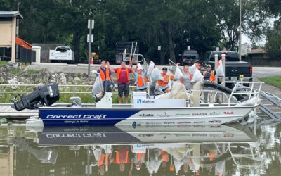 CORRECT CRAFT AND AKTION PARKS USE LAKE CLEAN UP BOAT