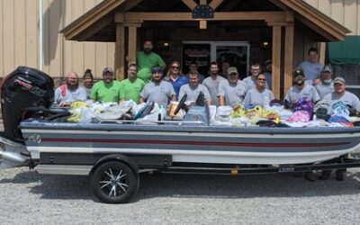 BASS CAT “FILLS THE BOAT” WITH SCHOOL SUPPLIES AND DOES LAKE CLEAN UP